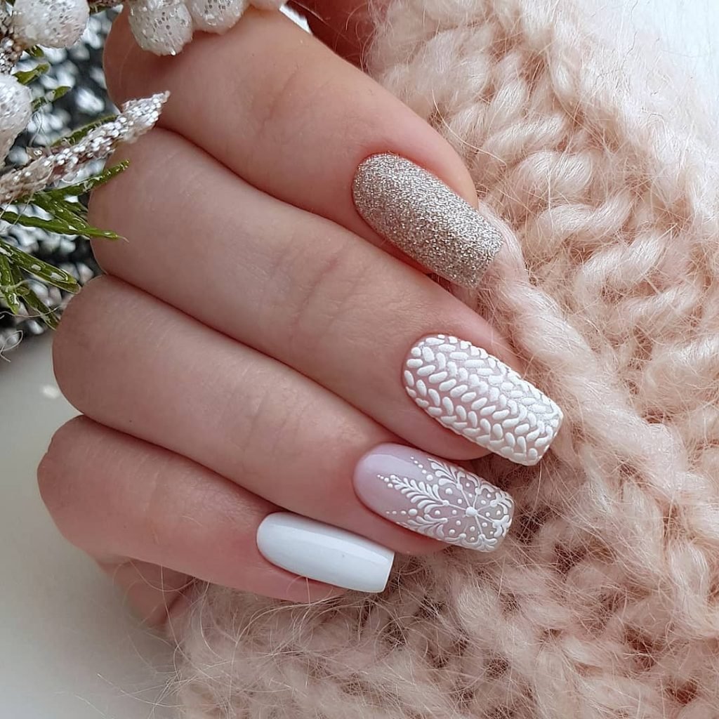 Winter Manicure With Ice Patterns And Snowflakes
